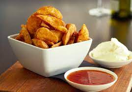 Potato wedges with sour cream